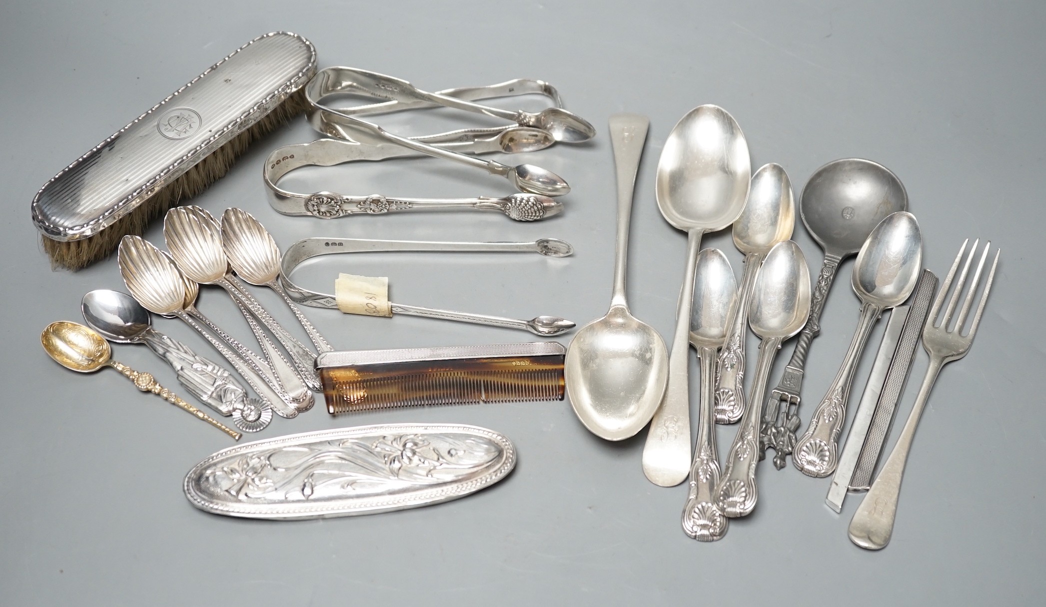 A small quantity of assorted silver flatware including a set of six teaspoons, by Peter, Ann & William Bateman, London, 1800, a pair of Victorian tablespoons, three pairs of silver sugar tongs etc. and a pewter spoon and